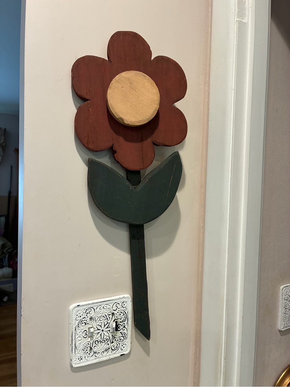 Vintage rustic painted wooden flower wall hanging featuring burgundy petals
